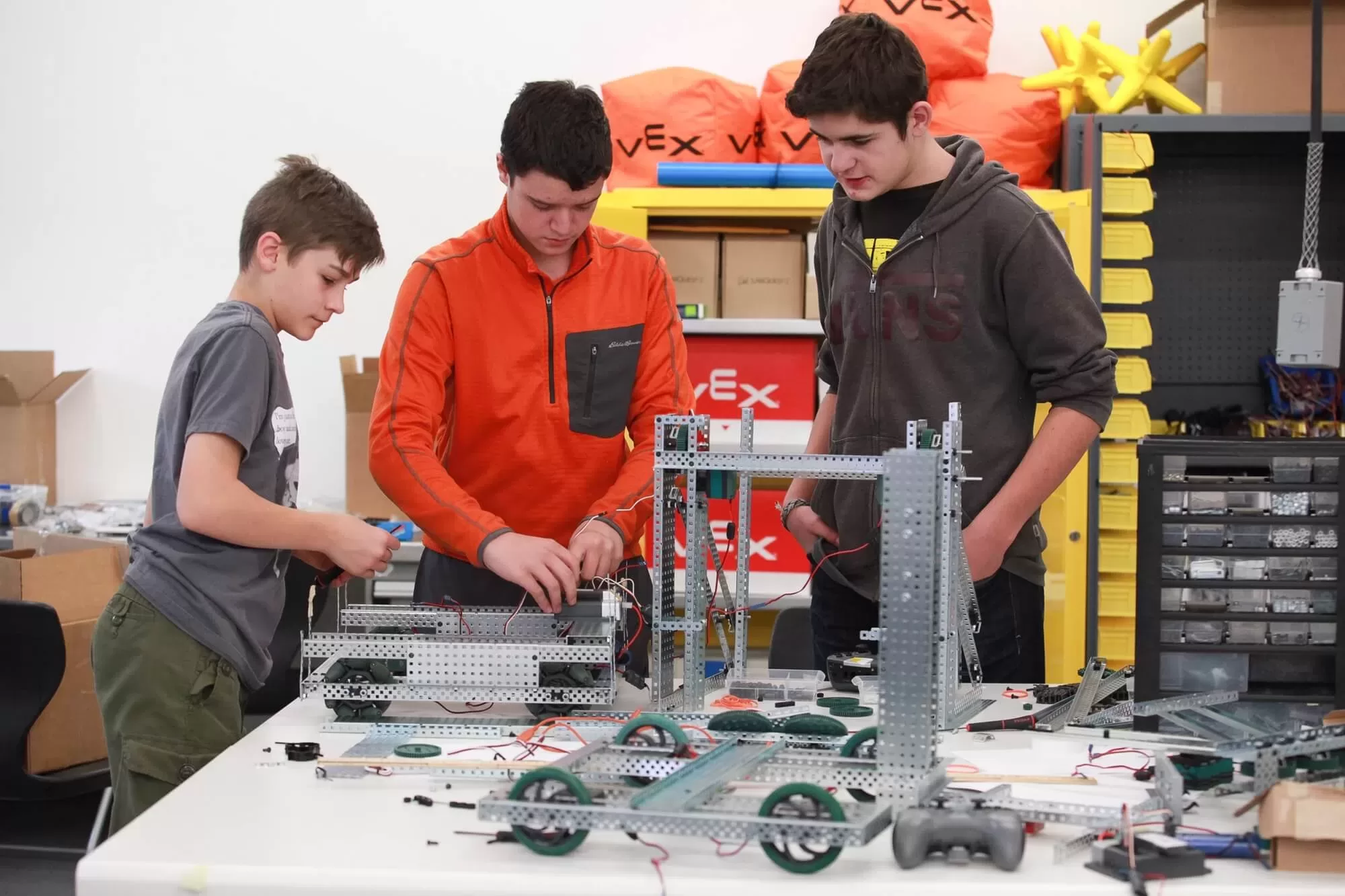 Three Teens Building Mechanics Set