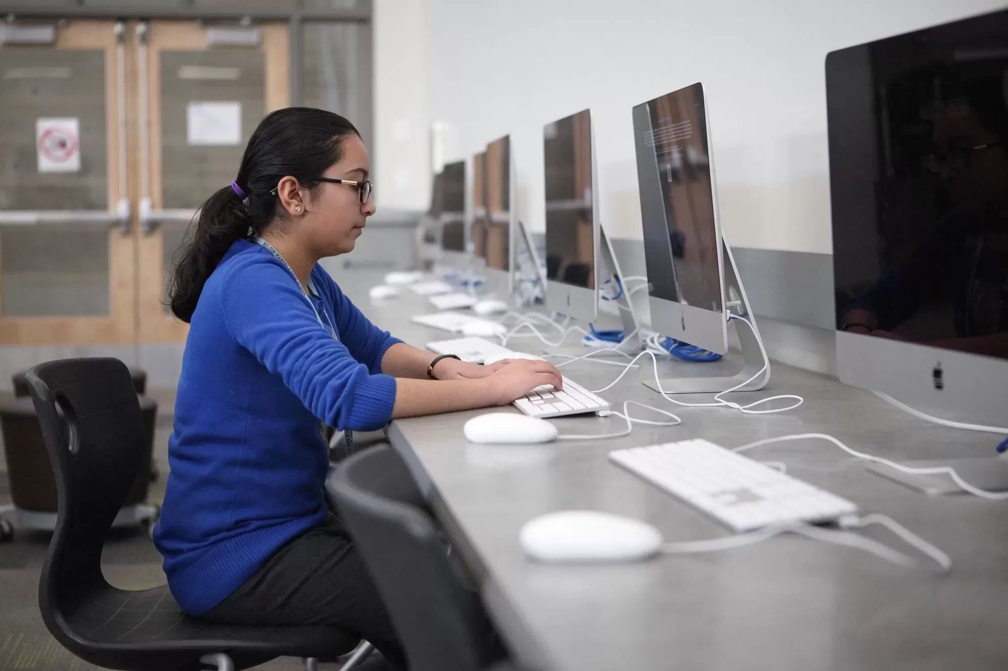 Girl on Apple Computer